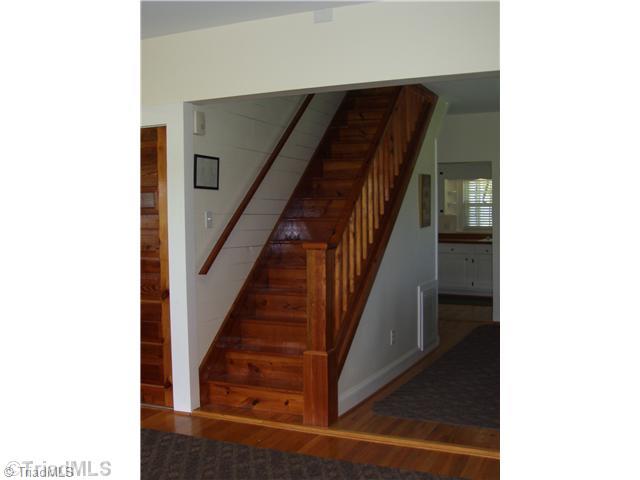 150 Ridge Road Mocksville, NC 27028 - Photo 9 of 16 Other. The owners kept the old farm house look in most of the house. You can see the refinished, glossy, hard wood stairway. Also some original walls are near the stairs as well.
