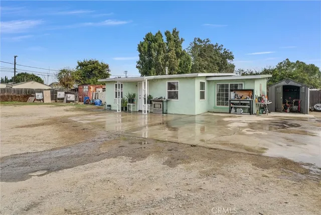 front view of a house with a patio