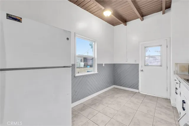 a bathroom with a sink a mirror and a toilet