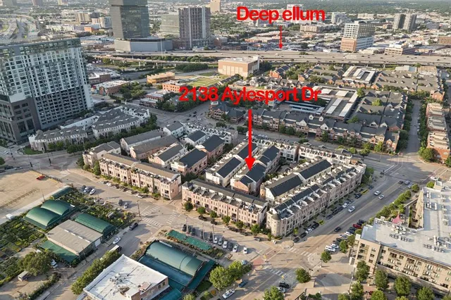 a view of a city with an ocean view