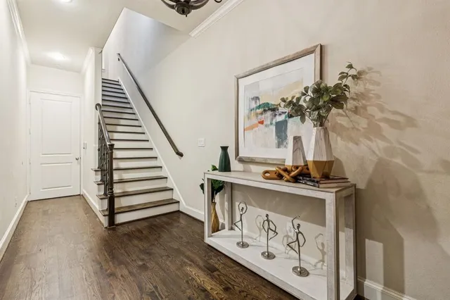 a view of a entryway with wooden floor