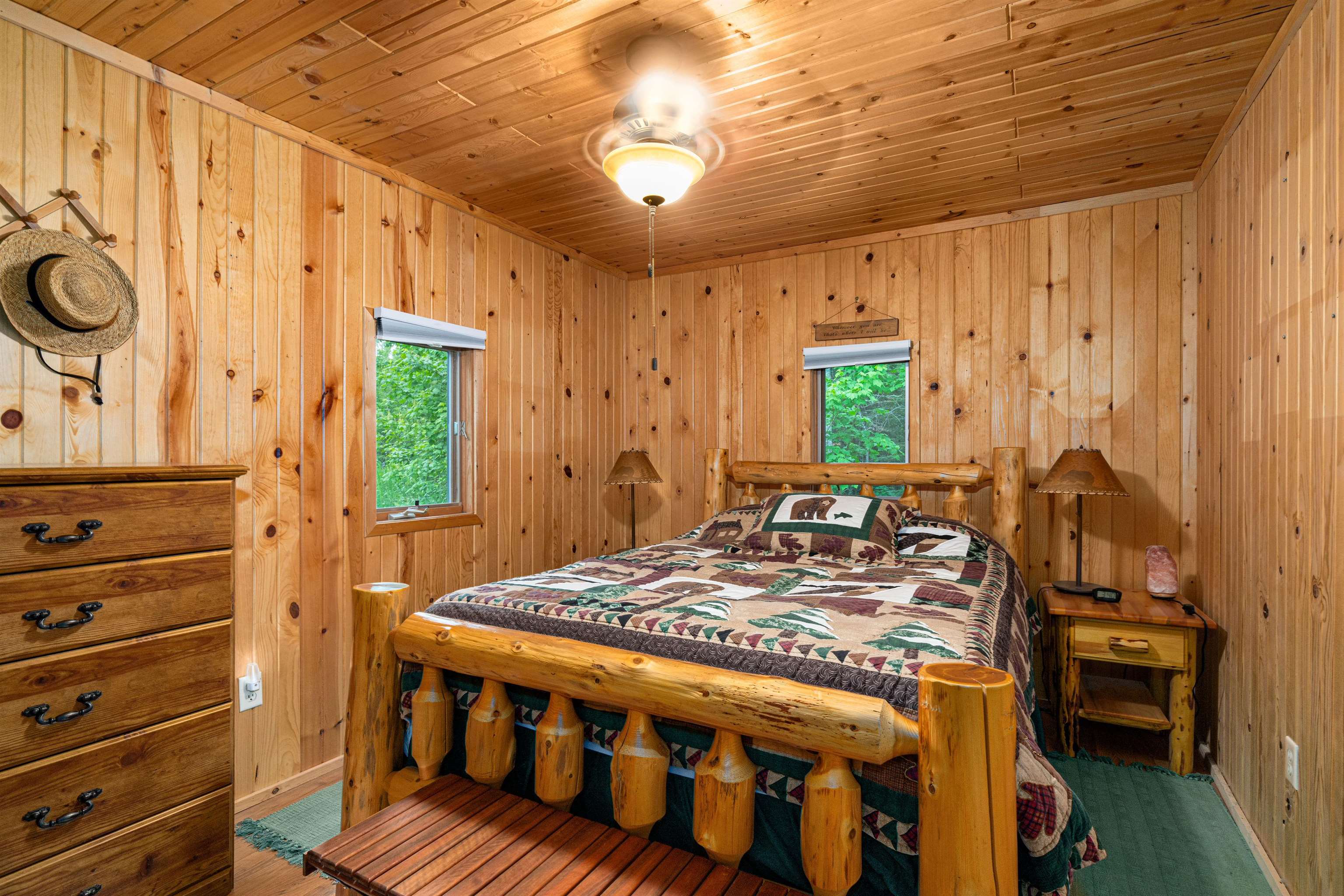 1207 Christianson Lake Road Two Harbors, MN 55616 - Photo 19 of 36 Bedroom featuring wooden walls and wood ceiling