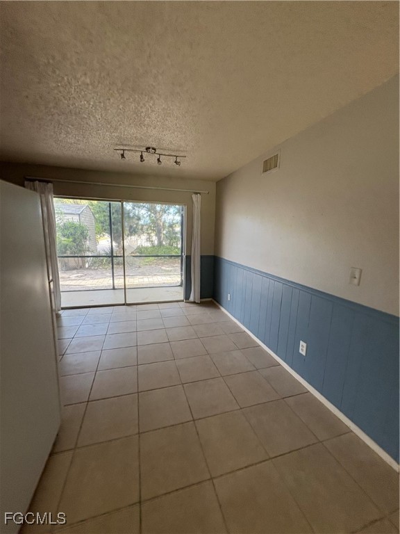 1560 Colonial Boulevard, Unit 136 Fort Myers, FL 33907 - Photo 5 of 10 a view of an empty room with a window