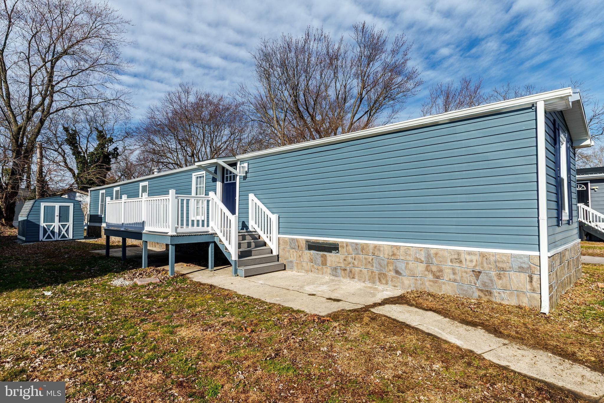 115 5th Street, Unit 40 Delaware City, DE 19706 - Photo 12 of 12 a view of a house with a patio
