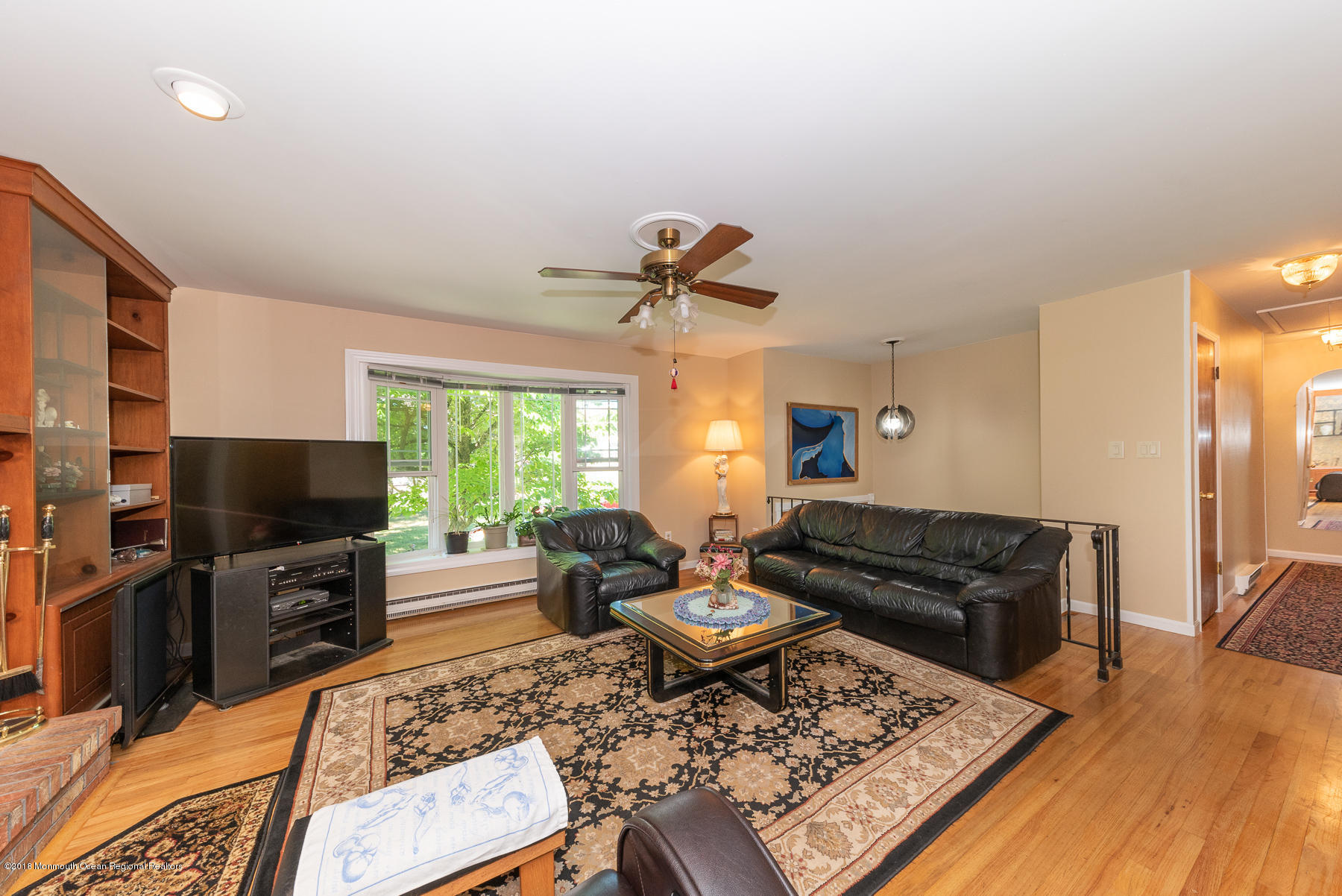 195 South New Prospect Road Jackson, NJ 08527 - Photo 4 of 28 a living room with furniture and a flat screen tv