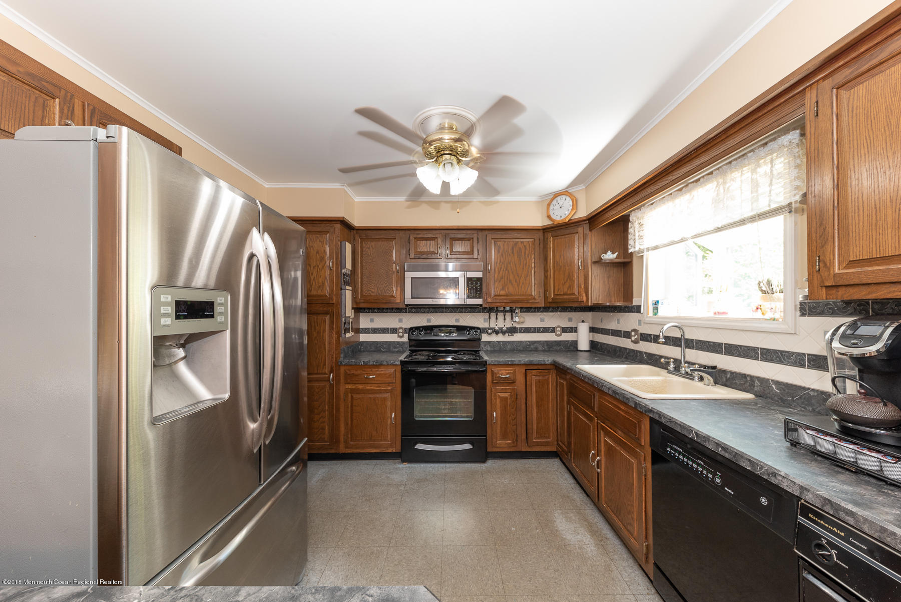 195 South New Prospect Road Jackson, NJ 08527 - Photo 8 of 28 a kitchen with stainless steel appliances granite countertop a stove a refrigerator and a sink