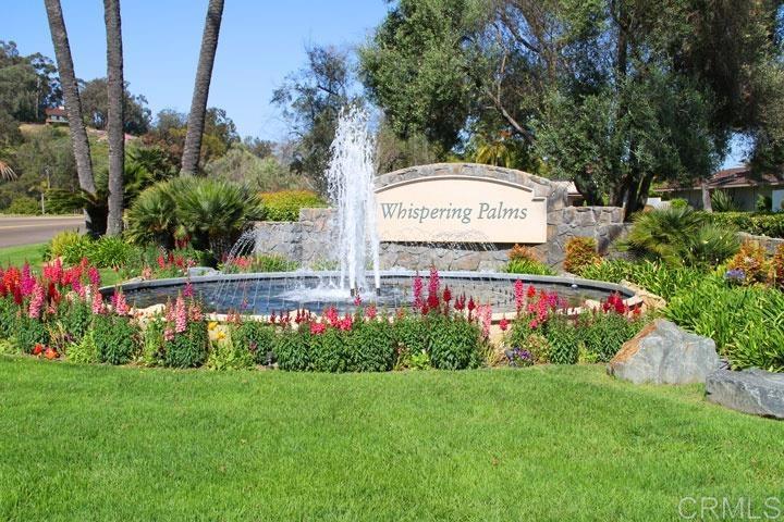 108 Via Coronado Rancho Santa Fe, CA 92091 - Photo 2 of 3 a sign on the side of the grass