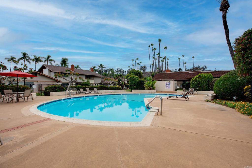 108 Via Coronado Rancho Santa Fe, CA 92091 - Photo 3 of 3 a view of a swimming pool with lawn chairs and a yard