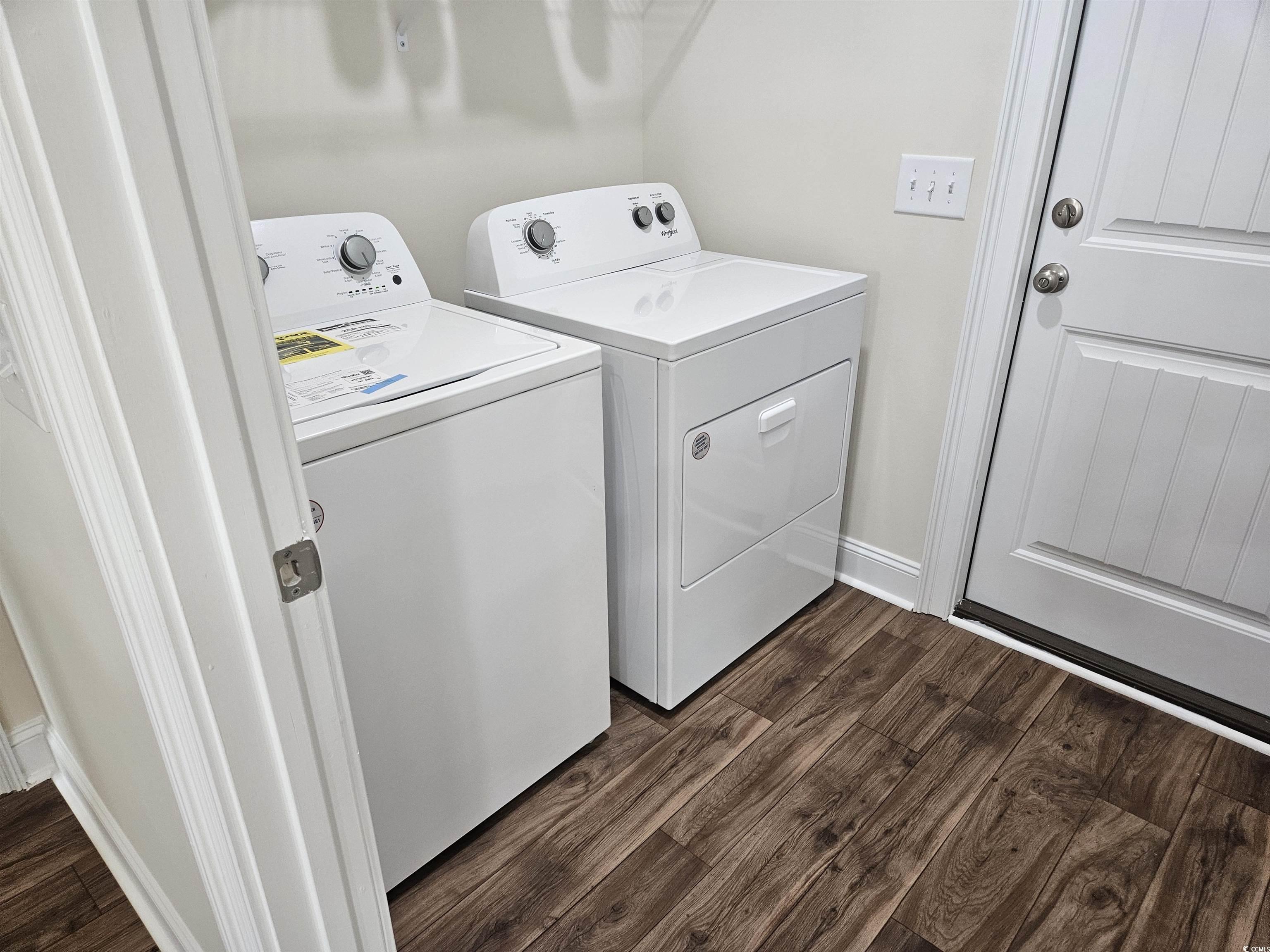 416 Hallie Martin Road Conway, SC 29527 - Photo 22 of 24 Laundry room featuring washer and dryer and dark h