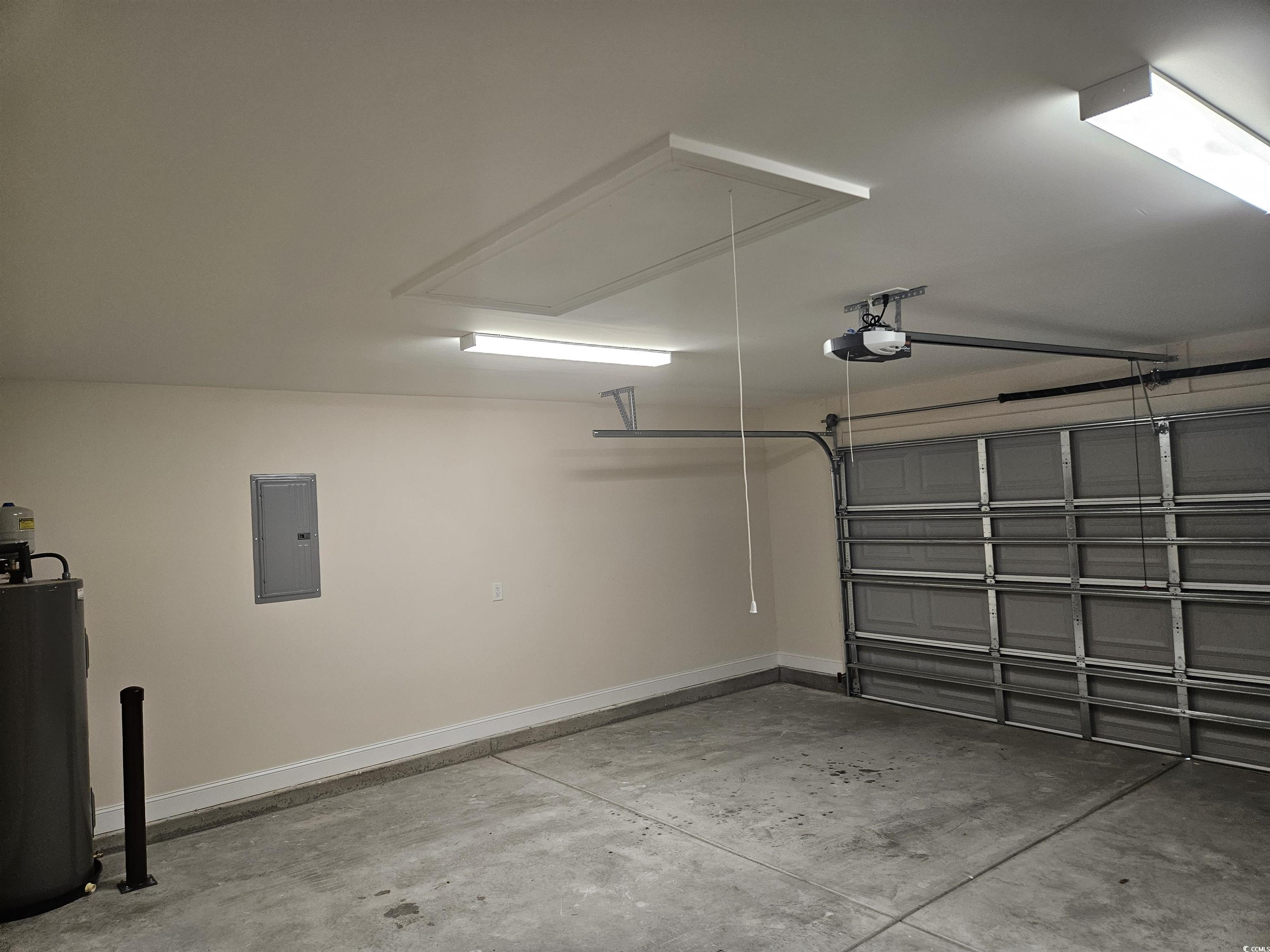 416 Hallie Martin Road Conway, SC 29527 - Photo 24 of 24 Garage with electric water heater, a garage door o