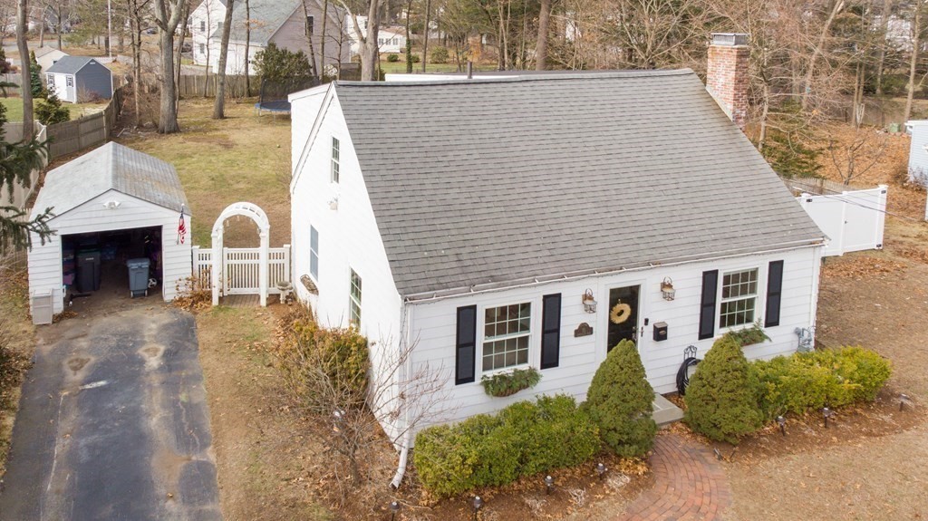 10 Longfellow Road Natick, MA 01760 - Photo 6 of 38 a front view of a house with a garden