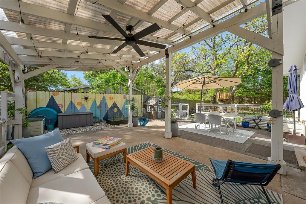 2216 Hermanson Drive Waco, TX 76710 - Photo 30 of 39 a backyard of a house with barbeque oven table and chairs
