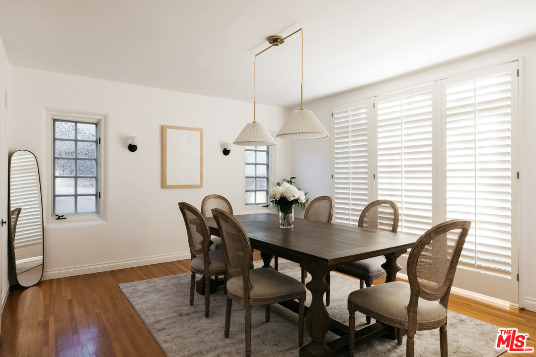 1640 Ard Eevin Avenue Glendale, CA 91202 - Photo 10 of 32 a view of a dining room with furniture window and wooden floor