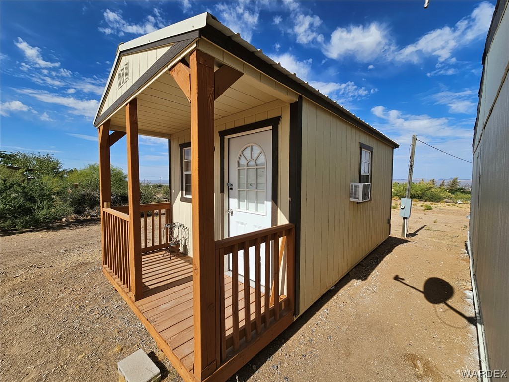 3549 North Bryce Road Golden Valley, AZ 86413 - Photo 3 of 20 a view of a house with backyard and deck