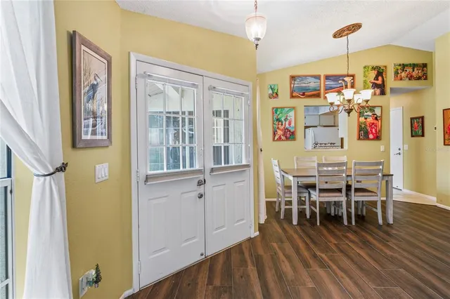 a kitchen with stainless steel appliances granite countertop a sink and cabinets