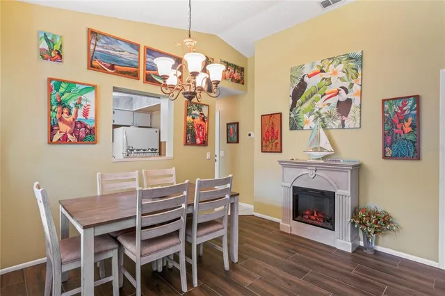 a kitchen with stainless steel appliances granite countertop a sink and a cabinets