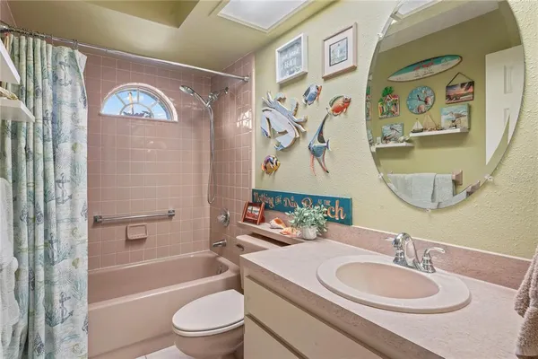 a aerial view of a house with a yard and plants