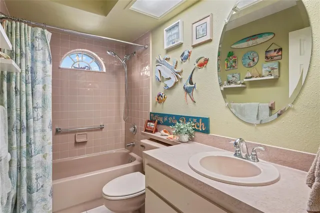 a aerial view of a house with a yard and plants