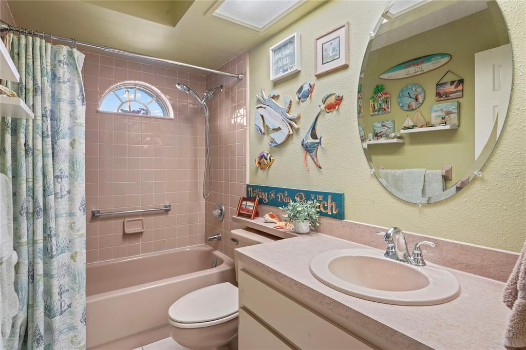 4740 Carrington Court New Port Richey, FL 34655 - Photo 40 of 66 a bathroom with a sink a toilet and a bathtub