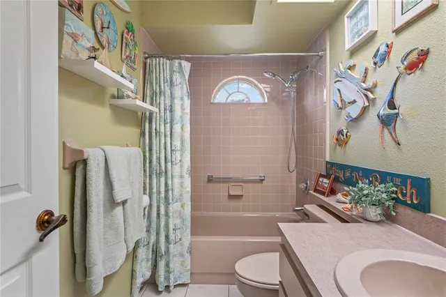 an aerial view of a house with a garden