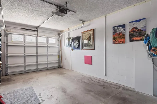 an aerial view of a house with a swimming pool