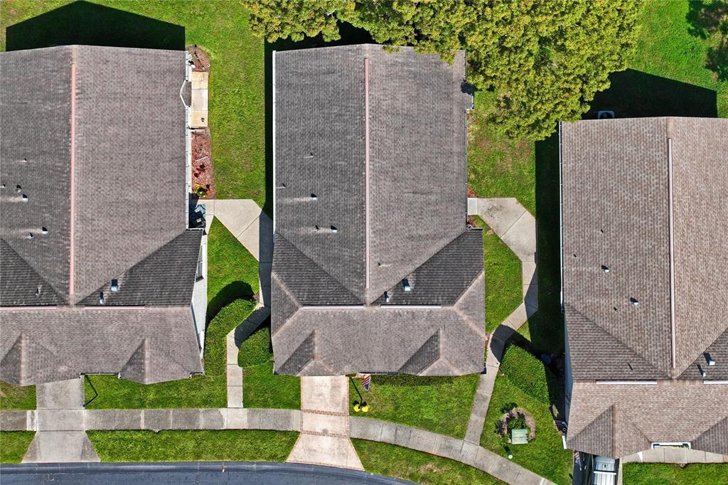4740 Carrington Court New Port Richey, FL 34655 - Photo 48 of 66 a aerial view of a house with a yard and plants