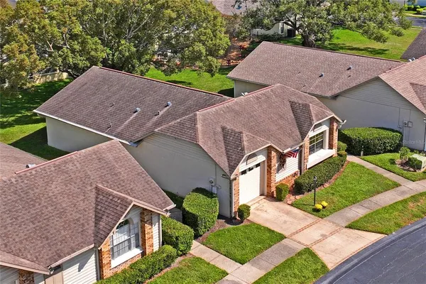 an outdoor view of a garden with sitting area