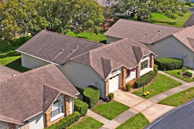 an outdoor view of a garden with sitting area