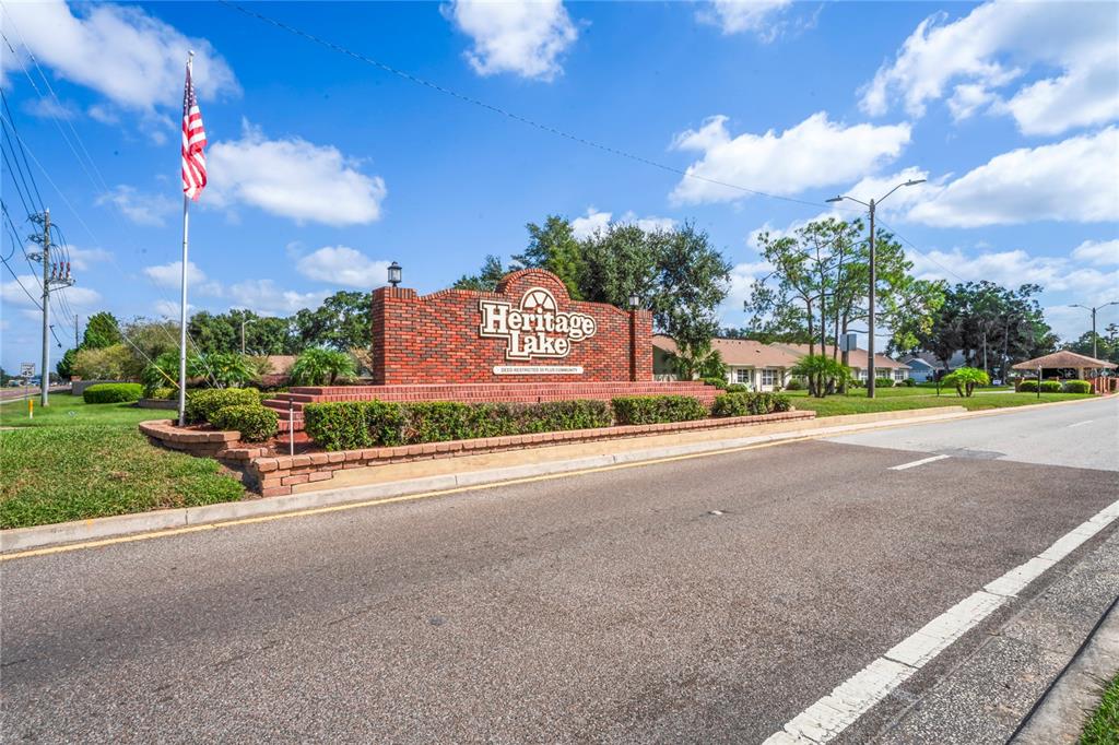 4740 Carrington Court New Port Richey, FL 34655 - Photo 57 of 66 a view of a street with a building in the background