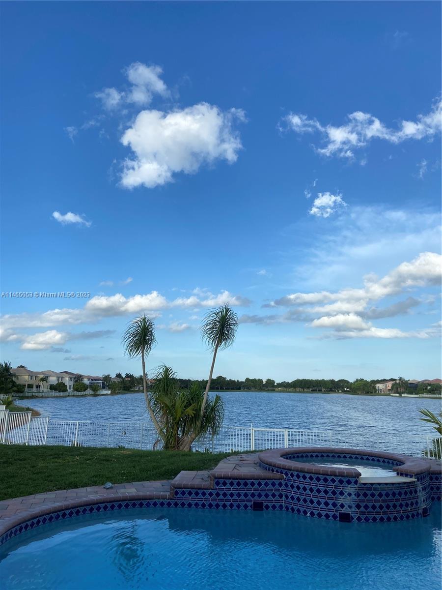2001 Southwest 157th Avenue Miramar, FL 33027 - Photo 7 of 20 a view of a lake and a yard