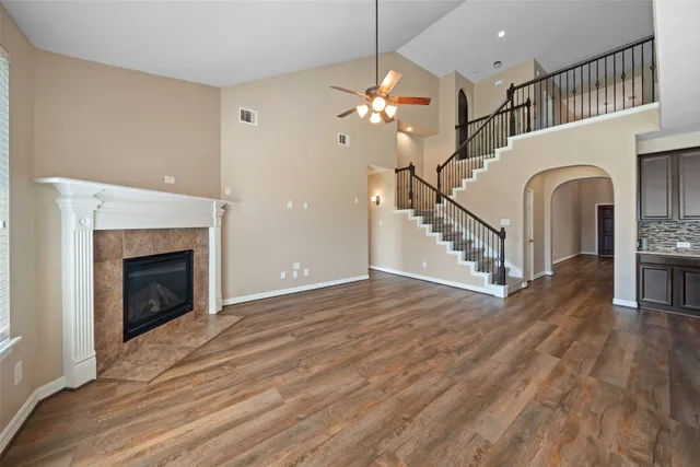 a view of an empty room fire place and a fireplace