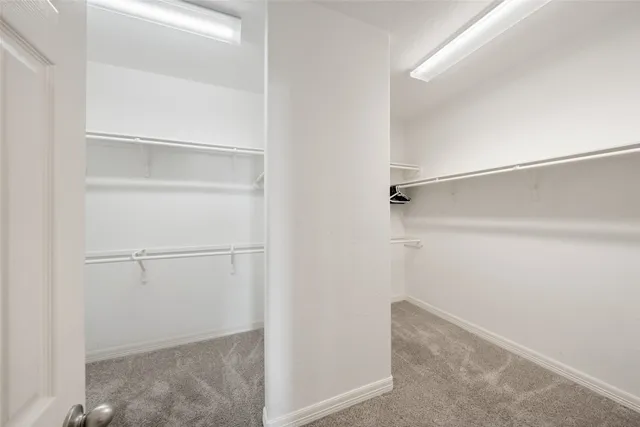 a view of an empty walk in closet