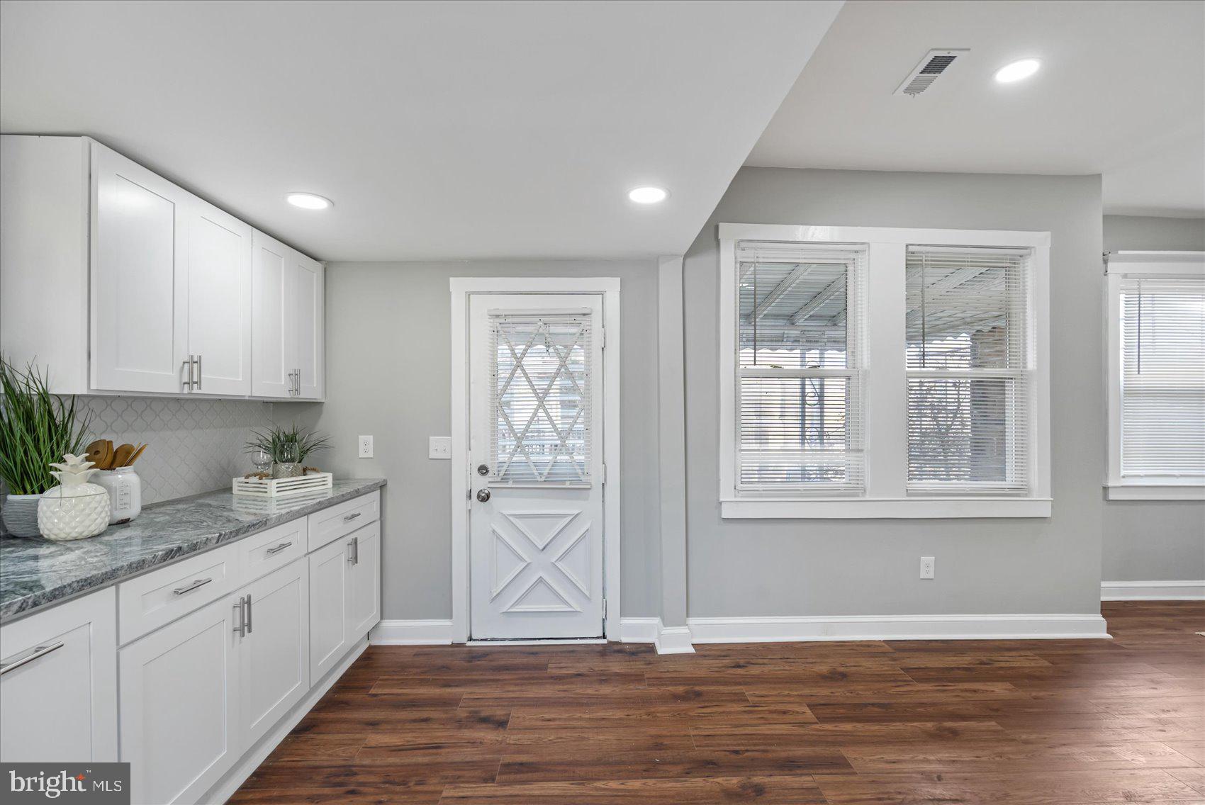 711 Old Home Road Baltimore, MD 21206 - Photo 14 of 42 Kitchen With Access To Back Deck