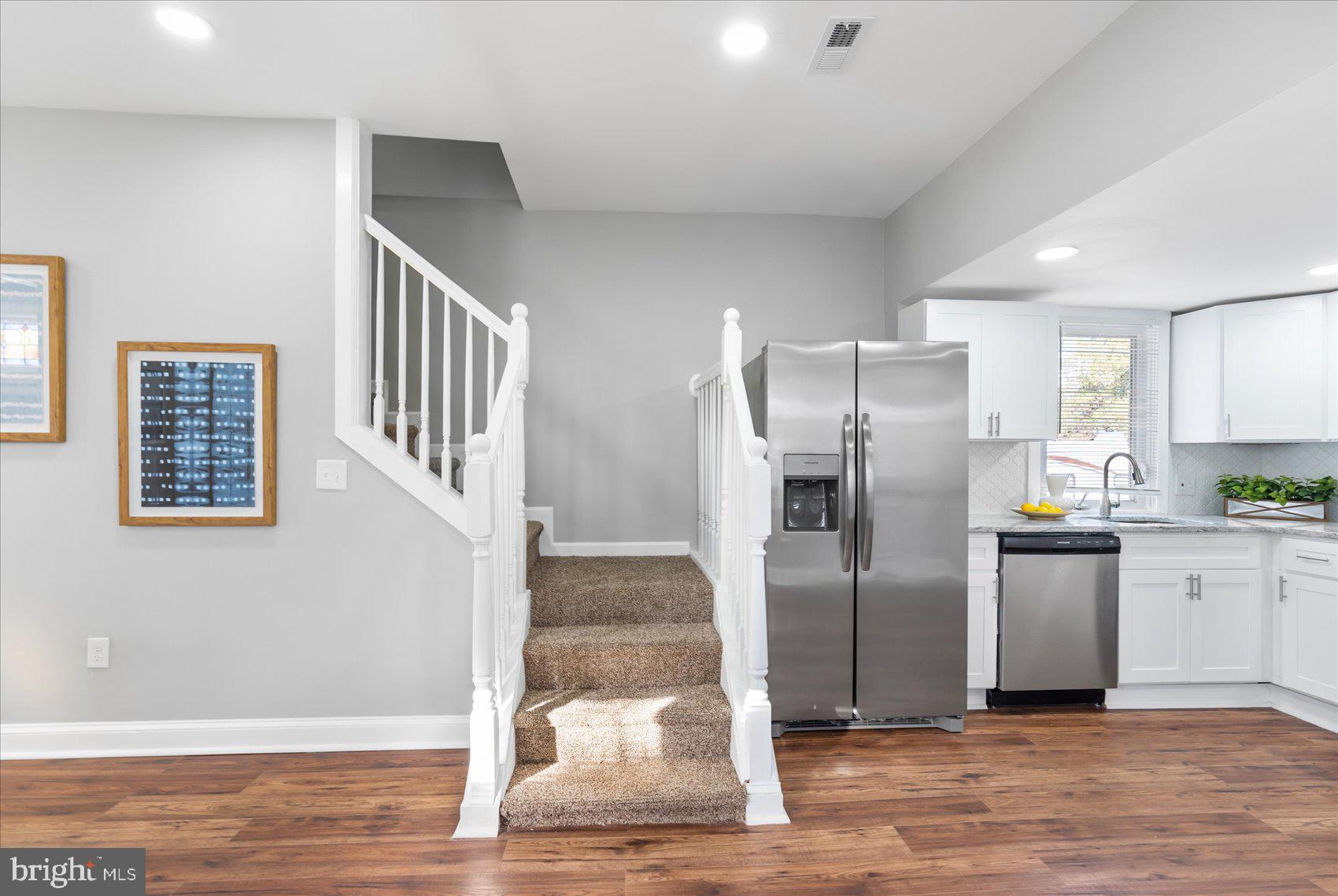 711 Old Home Road Baltimore, MD 21206 - Photo 22 of 42 Staircase To Upper Level