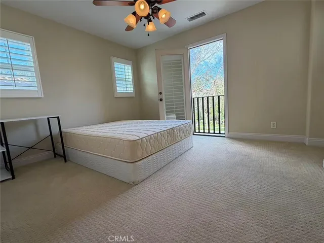 a bathroom with a shower and toilet