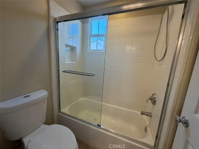 a view of balcony with furniture