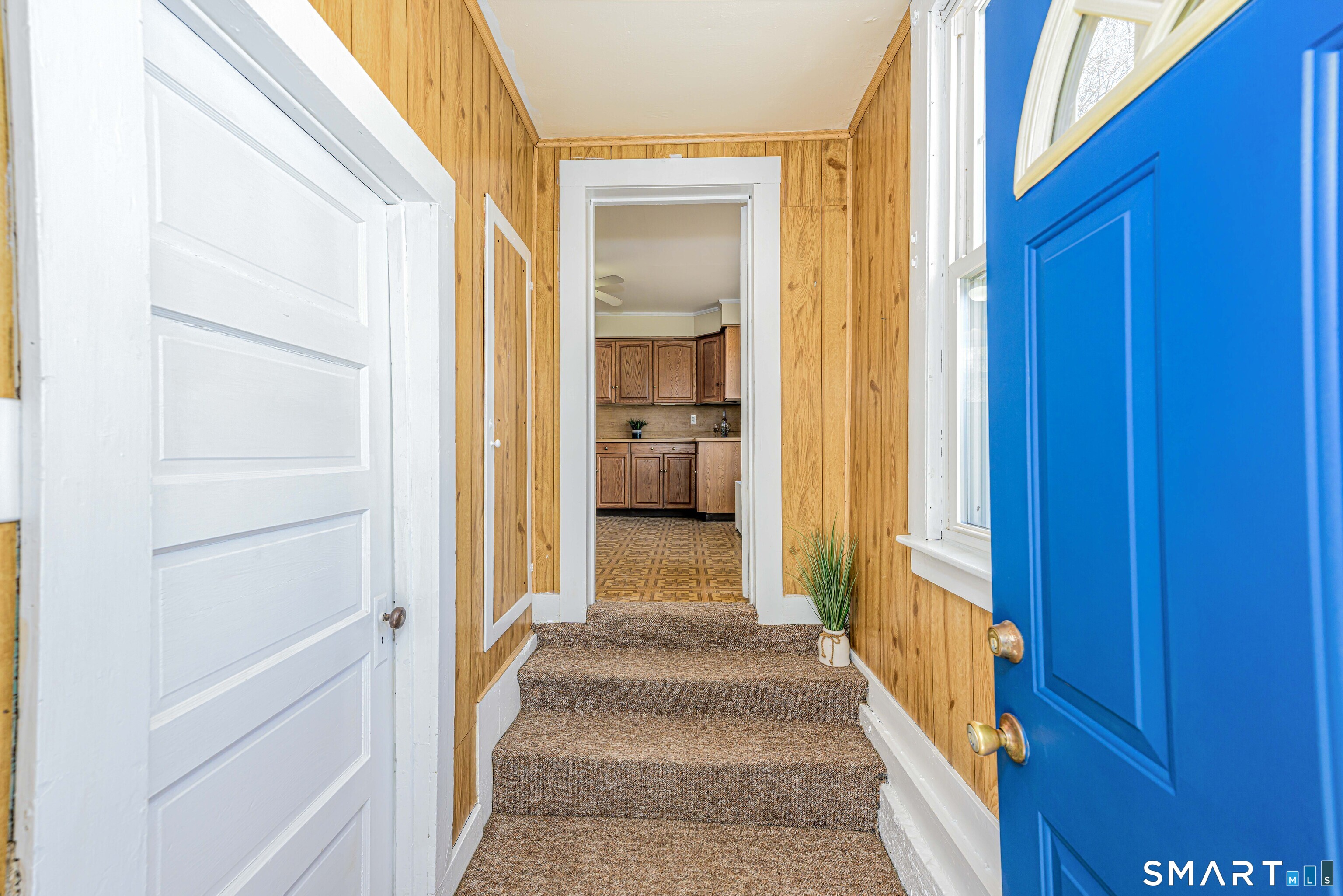 45 Rimmon Road North Haven, CT 06473 - Photo 15 of 40 Coming in through the side door there is a mudroom with an easy second access to the basement on the left.