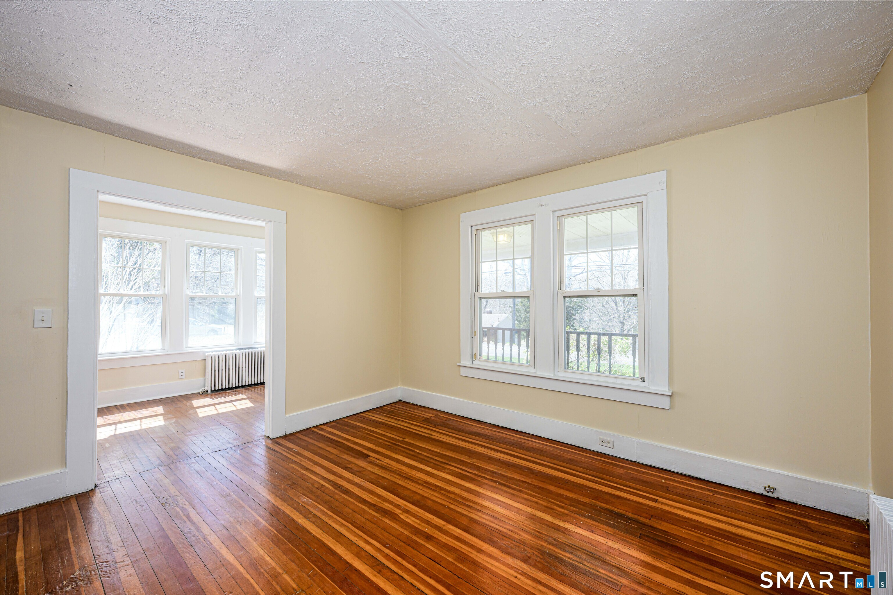 45 Rimmon Road North Haven, CT 06473 - Photo 7 of 40 Living room looking towards the sunroom.