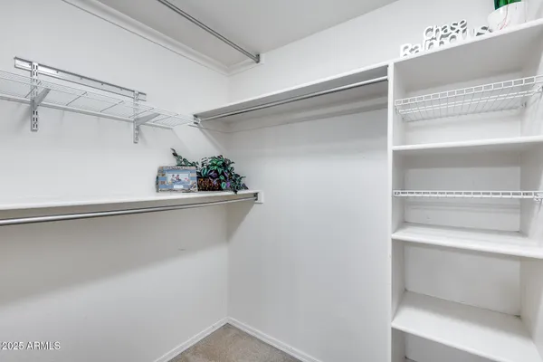 a view of a room with racks on the wall