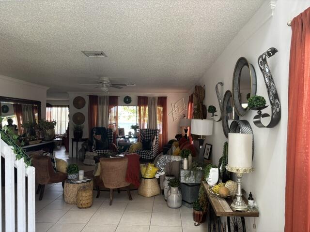 6207 Adriatic Way West Palm Beach, FL 33413 - Photo 9 of 26 a room with lots of bottles of alcohol