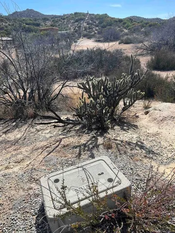 a view of a back yard from a balcony