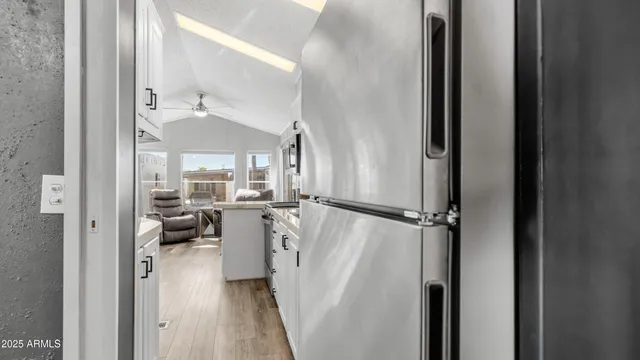 a view of a living room with a large window