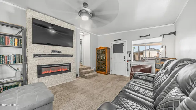 a view of a patio with a table and chairs and potted plants