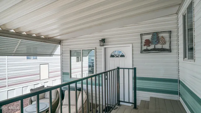 a view of a balcony with a potted plant