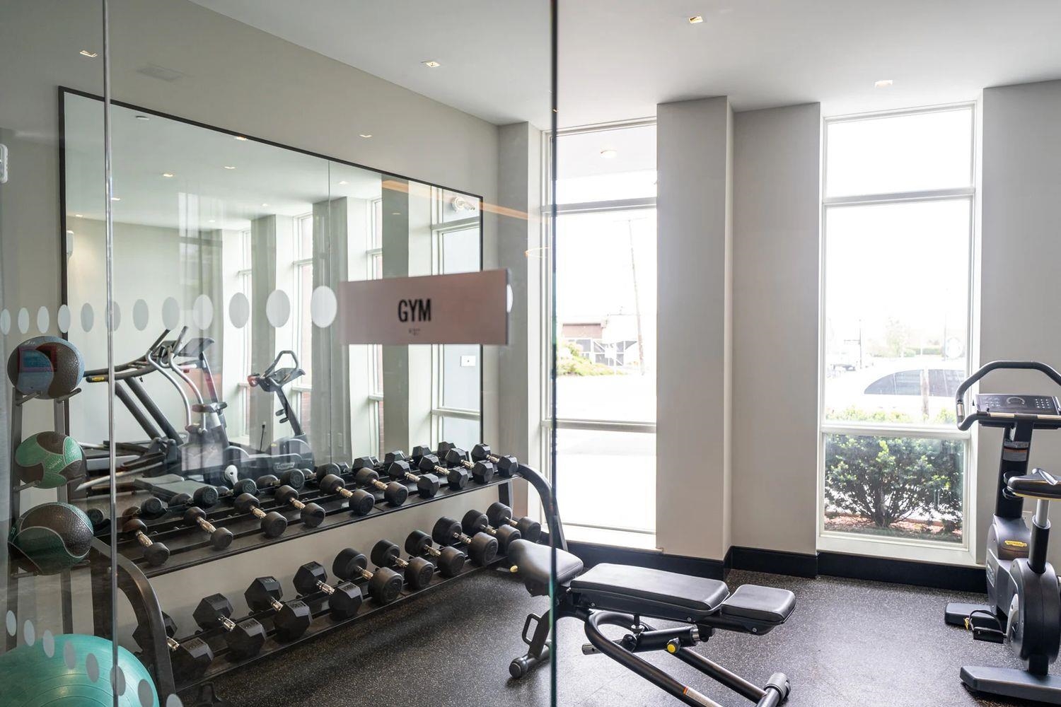 16 Bennett Street, Unit 211 Jersey City, NJ 07304 - Photo 19 of 24 a view of a room with gym equipment