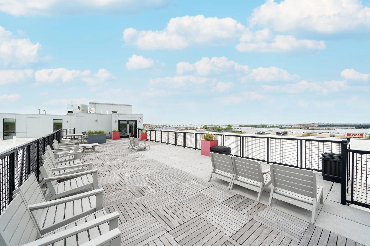 16 Bennett Street, Unit 211 Jersey City, NJ 07304 - Photo 21 of 24 a view of terrace with seating space and barbeque oven