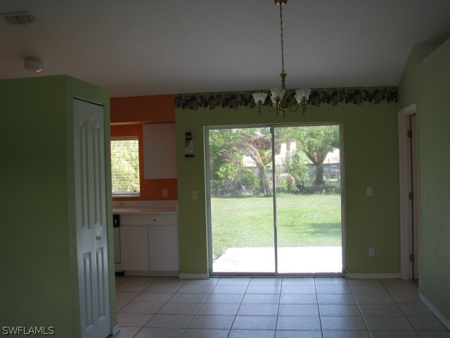 5371 17th Avenue Southwest Naples, FL 34116 - Photo 4 of 5 a view of an entryway with a door