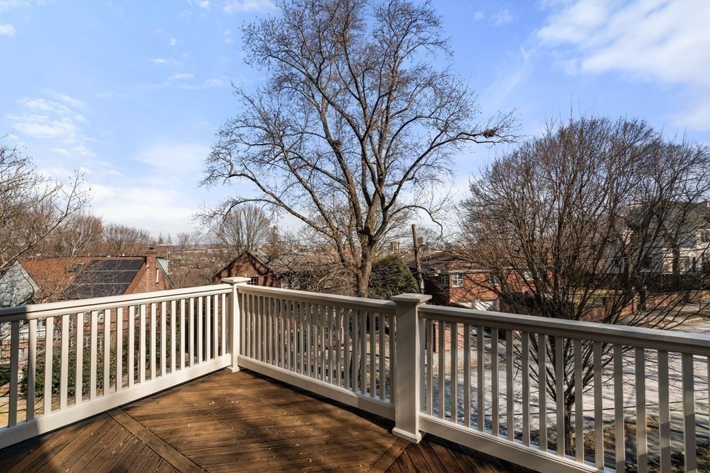 204 Lancaster Terrace Brookline, MA 02446 - Photo 15 of 32 a balcony with trees in front of it