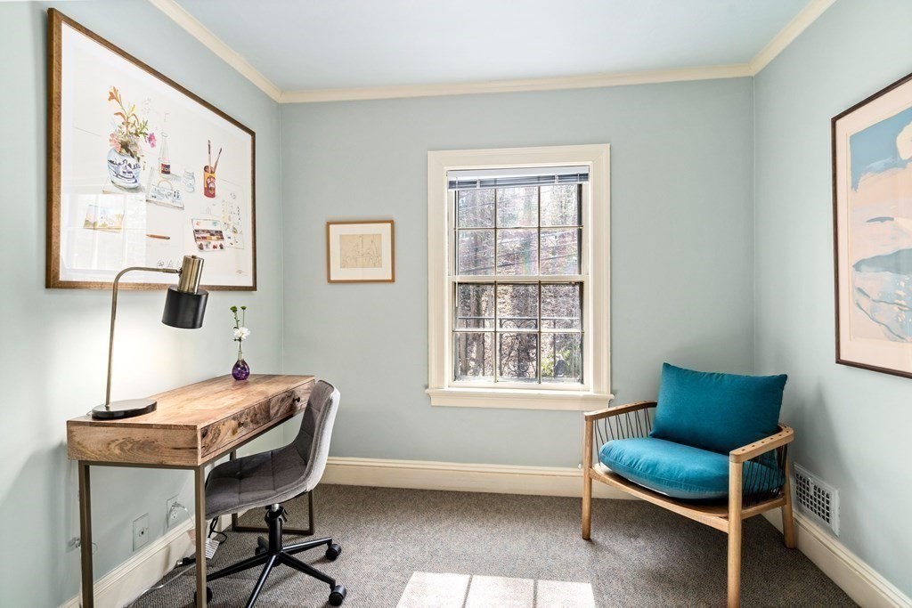204 Lancaster Terrace Brookline, MA 02446 - Photo 17 of 32 a living room with furniture and a window