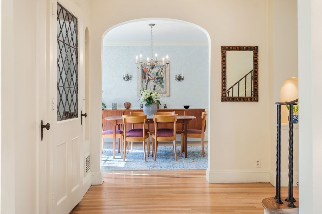 204 Lancaster Terrace Brookline, MA 02446 - Photo 2 of 32 a view of a dining room with furniture and wooden floor